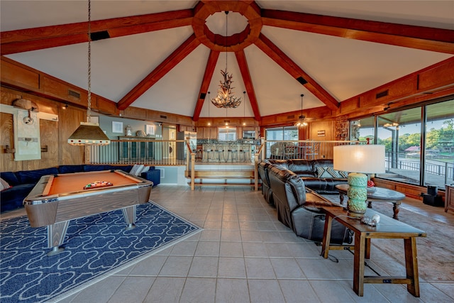 rec room with beam ceiling, high vaulted ceiling, wooden walls, tile patterned flooring, and pool table