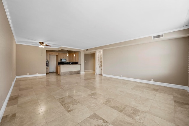 unfurnished living room featuring ceiling fan, crown molding, visible vents, and baseboards