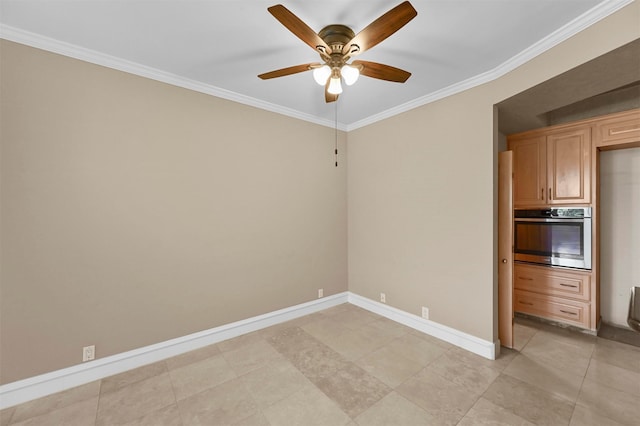 unfurnished room featuring ceiling fan and ornamental molding