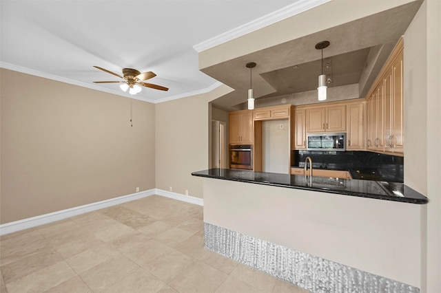 kitchen with baseboards, ornamental molding, a peninsula, stainless steel appliances, and light brown cabinetry