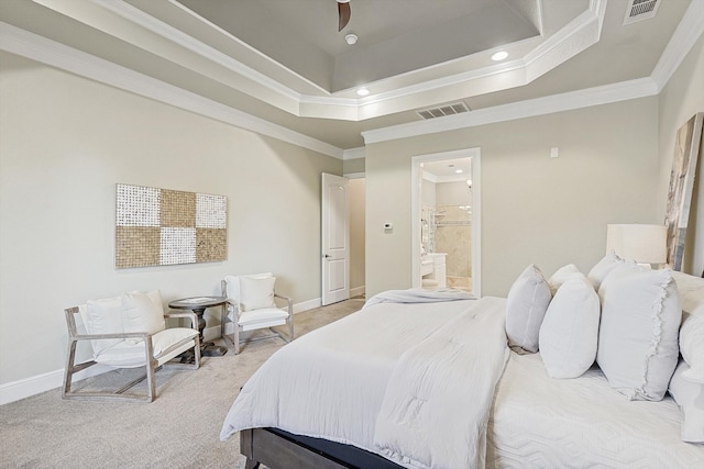 carpeted bedroom with crown molding, a tray ceiling, and ceiling fan