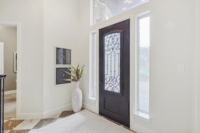 foyer entrance featuring a wealth of natural light