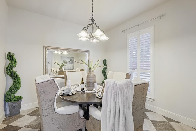 dining area with a notable chandelier