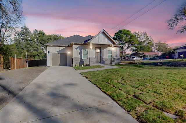 view of front of home with a yard