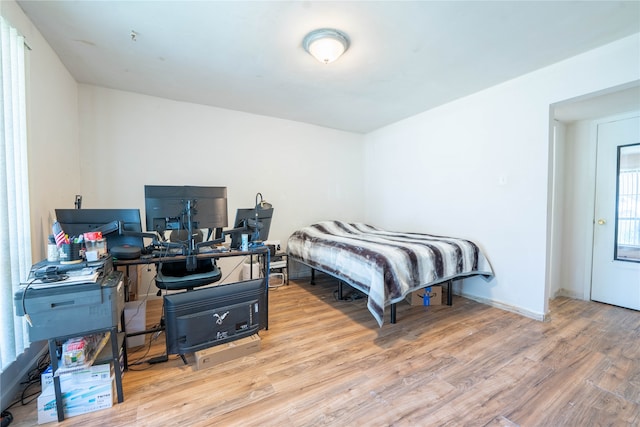 bedroom featuring light hardwood / wood-style floors