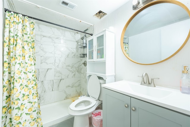 bathroom with toilet, curtained shower, and vanity