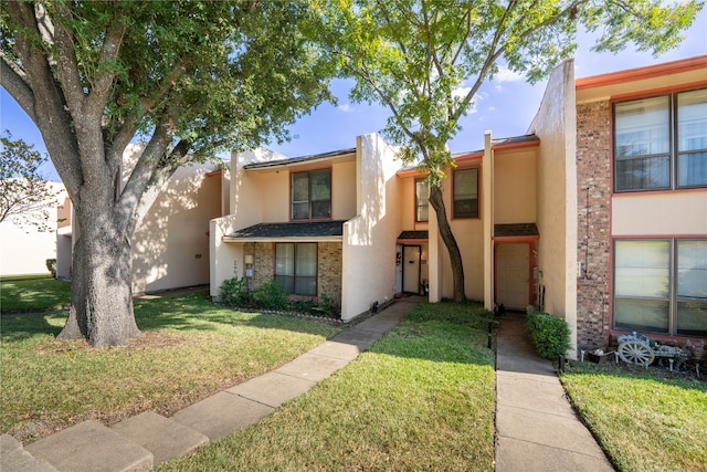 view of property with a front yard