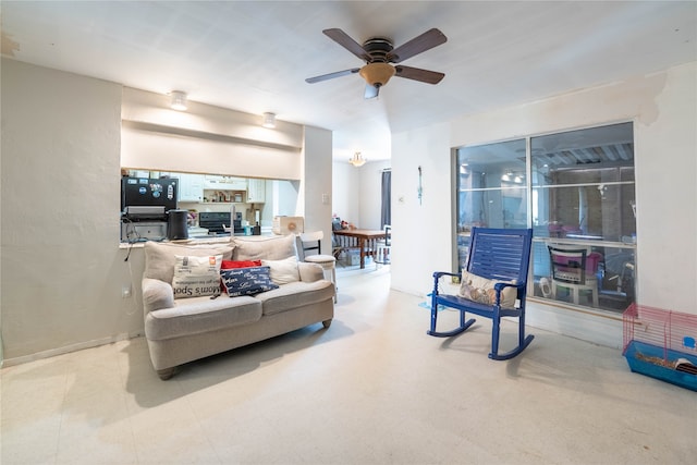 living room with ceiling fan