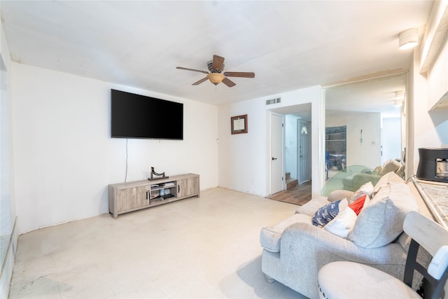 living room featuring ceiling fan