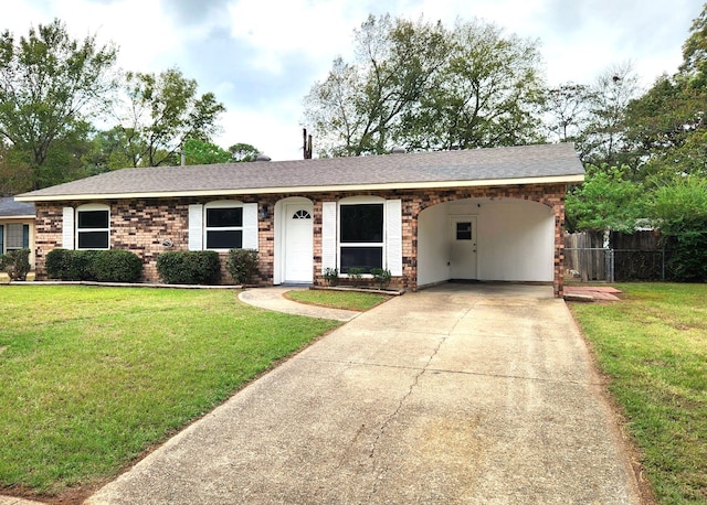 ranch-style house with a front lawn and a carport