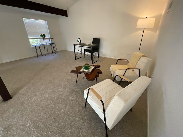 sitting room with carpet and lofted ceiling with beams