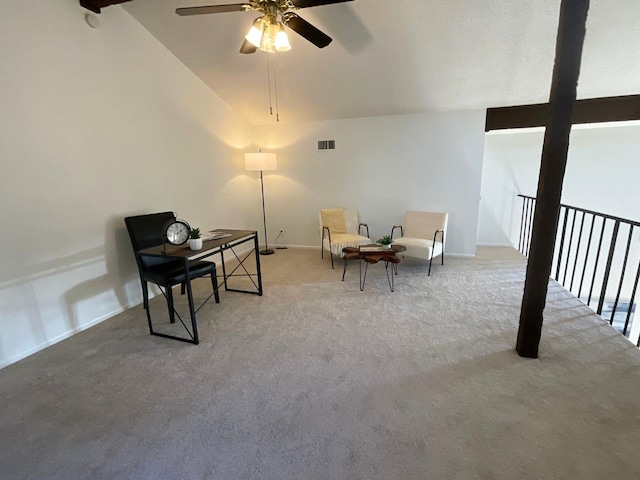 sitting room with carpet flooring, lofted ceiling with beams, and ceiling fan