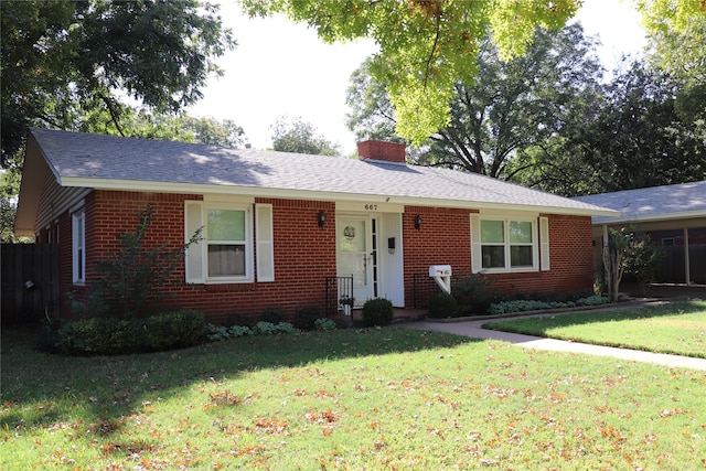 single story home with a front yard