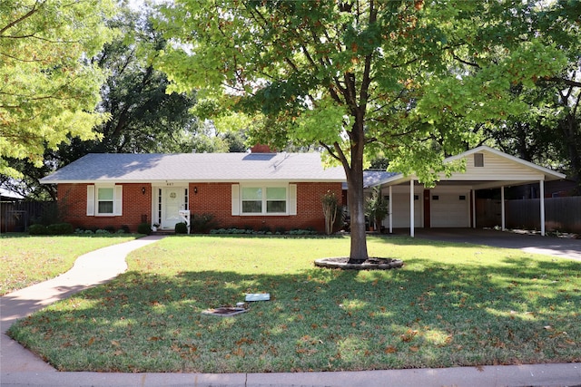 ranch-style house with a garage, a front lawn, and a carport