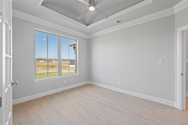 spare room with crown molding, light hardwood / wood-style floors, and ceiling fan