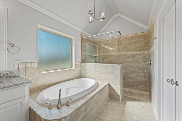 bathroom featuring independent shower and bath, vaulted ceiling, ornamental molding, vanity, and tile patterned flooring