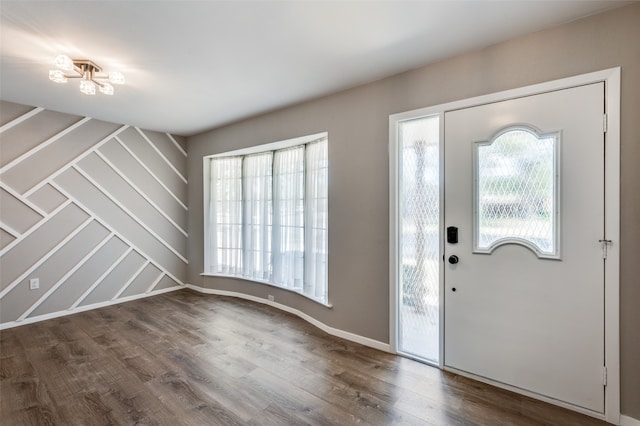 entryway with dark hardwood / wood-style floors