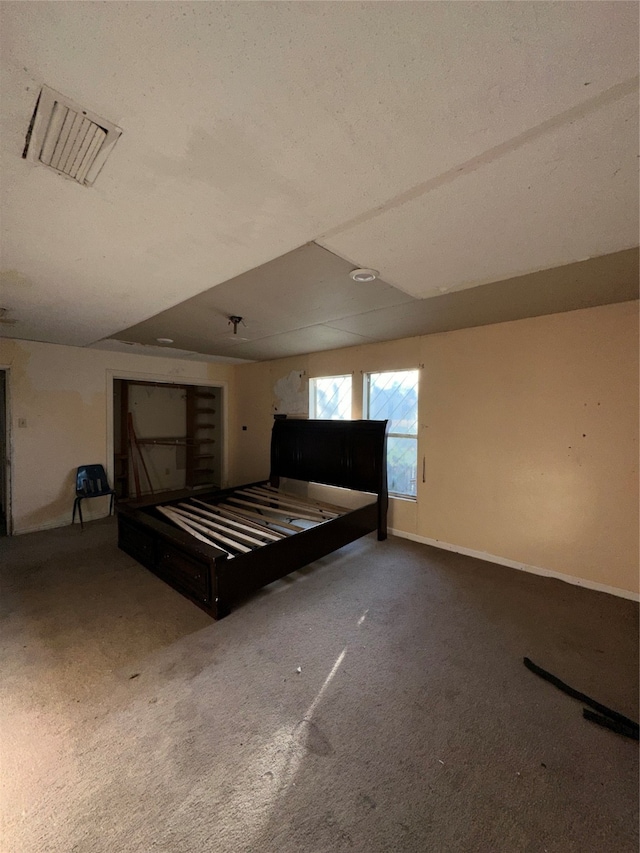 unfurnished bedroom with carpet