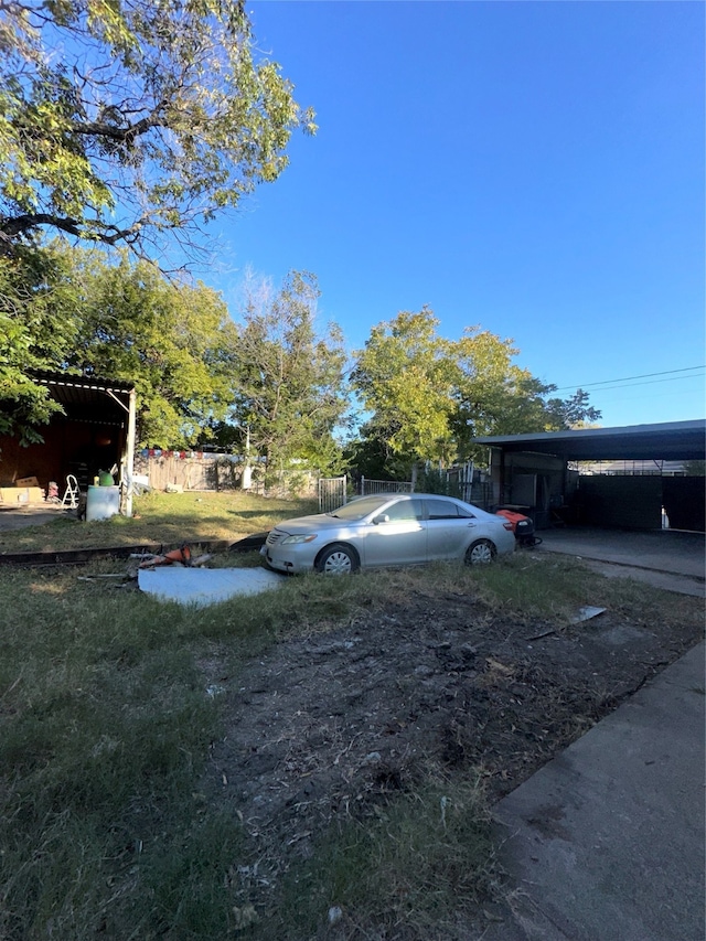 view of yard featuring a carport