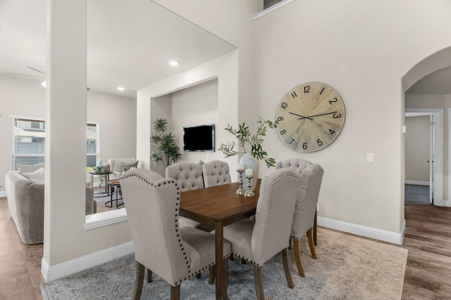 dining room with hardwood / wood-style flooring