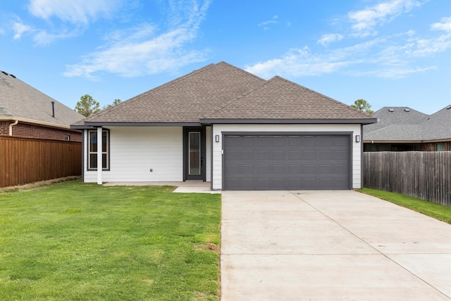 single story home featuring a front yard and a garage