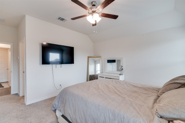 carpeted bedroom featuring lofted ceiling and ceiling fan