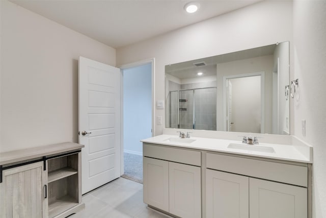 723 Cherish Day Dr, Lavon, TX 75166 - bathroom with a stall shower, double vanity, and tile patterned floors