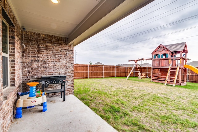 723 Cherish Day Dr, Lavon, TX 75166 - view of yard featuring a playground and a patio area