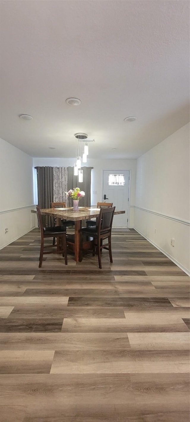 dining room featuring hardwood / wood-style flooring