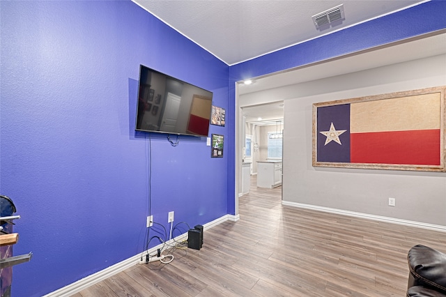 interior space with hardwood / wood-style floors