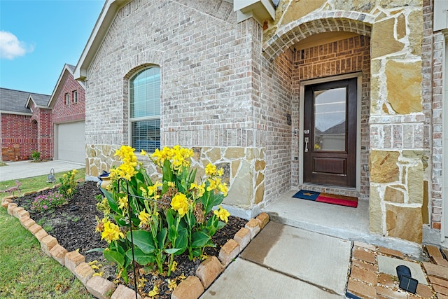 property entrance featuring a garage