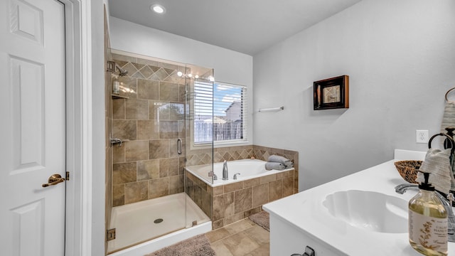 bathroom featuring vanity, a chandelier, plus walk in shower, and tile patterned floors