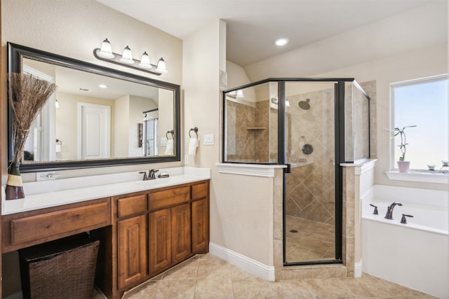 bathroom with vanity, separate shower and tub, and tile patterned floors