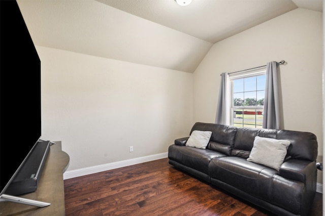 living room with dark wood-type flooring and lofted ceiling