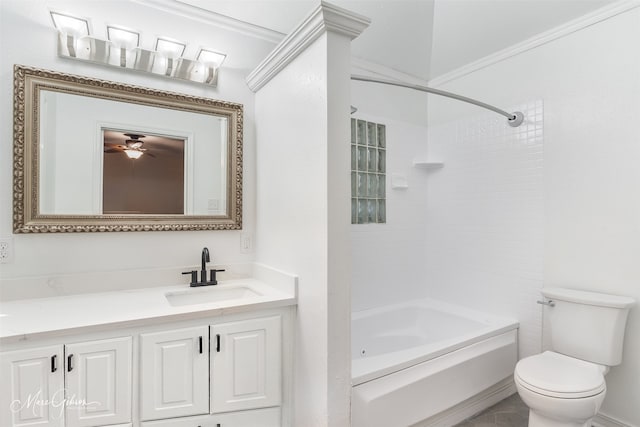 full bathroom with vanity, crown molding, tiled shower / bath, ceiling fan, and toilet