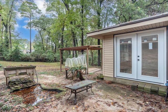 view of patio featuring french doors