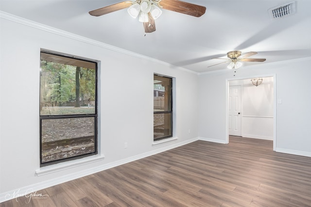 unfurnished room with ceiling fan, dark wood-type flooring, and ornamental molding