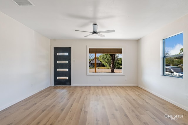 foyer featuring light hardwood / wood-style floors and ceiling fan