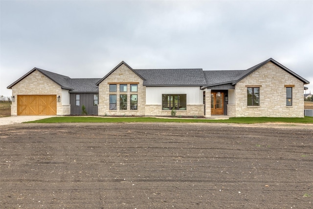 view of front of property with a garage