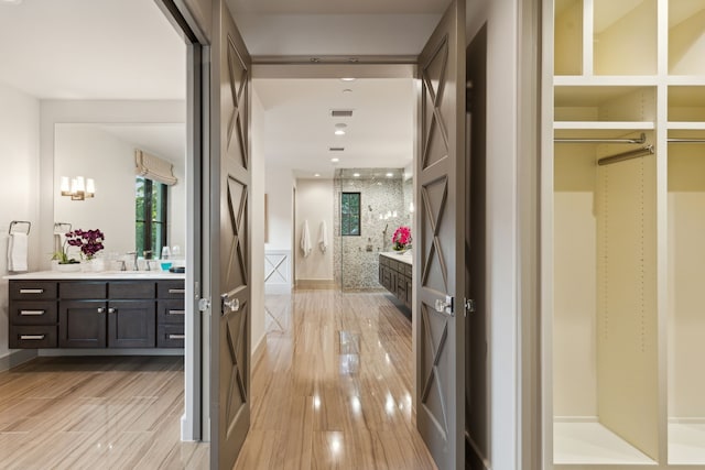 hallway featuring light hardwood / wood-style flooring