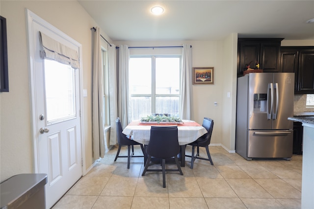 view of tiled dining space