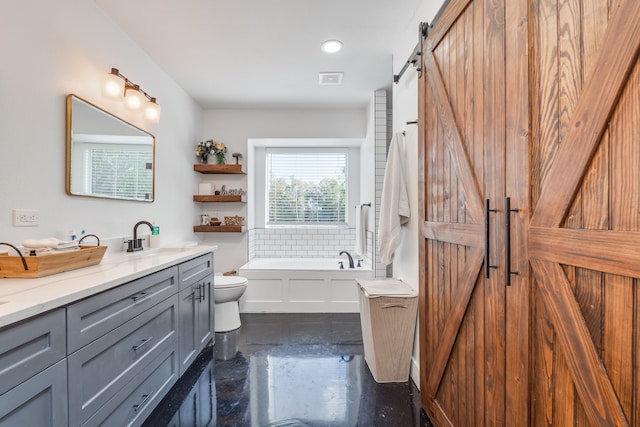 bathroom with toilet, concrete flooring, vanity, and a bathtub