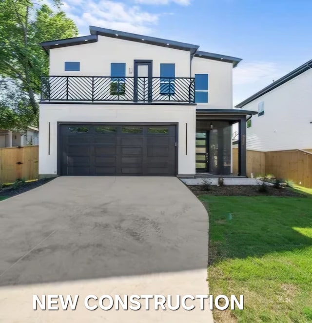 contemporary home with a balcony, a garage, and a front lawn