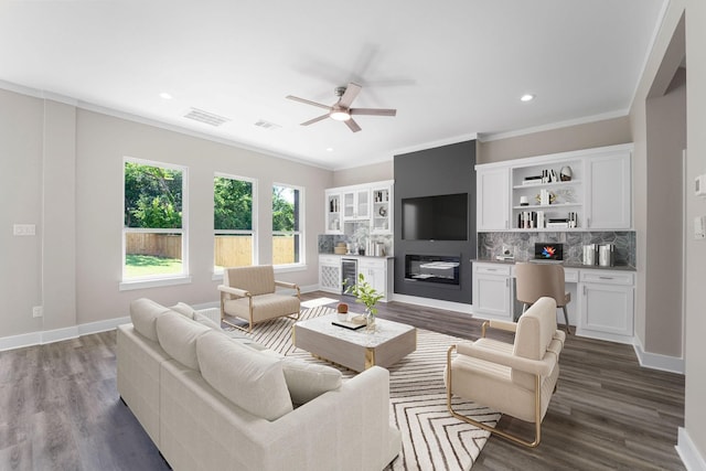 living room with crown molding, wine cooler, wood-type flooring, and ceiling fan