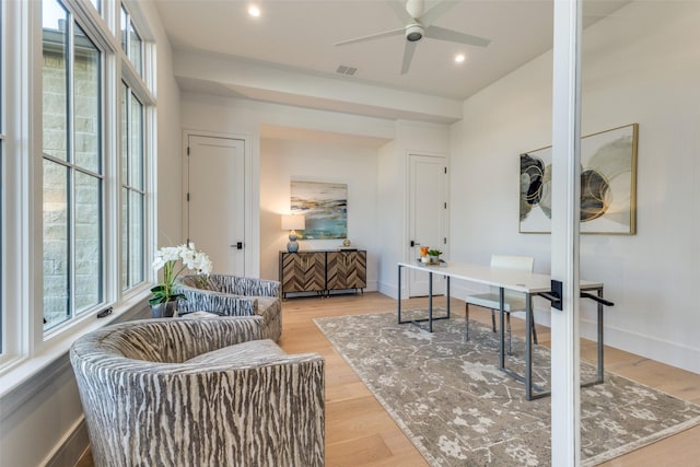 office area featuring ceiling fan and light hardwood / wood-style floors