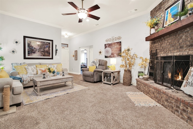 carpeted living room with crown molding, a brick fireplace, and ceiling fan