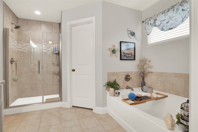 bathroom featuring plus walk in shower and tile patterned flooring