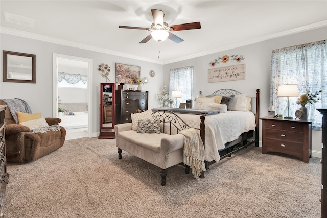 carpeted bedroom with connected bathroom, crown molding, multiple windows, and ceiling fan