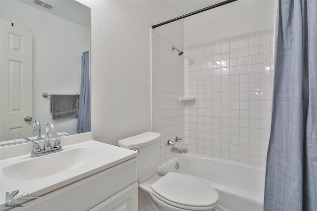 full bathroom featuring vanity, toilet, and shower / bath combo with shower curtain