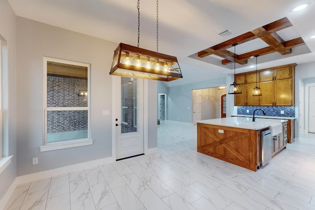 kitchen featuring stainless steel dishwasher, a kitchen island with sink, decorative light fixtures, and tasteful backsplash